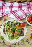 Tortilla and grilled vegetables photo