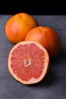 Ripe grapefruit on table close-up photo