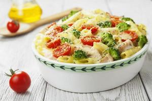 Casserole pasta with chicken and broccoli photo