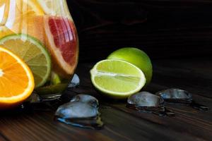 Detox citrus water. Refreshing summer homemade lemonade photo