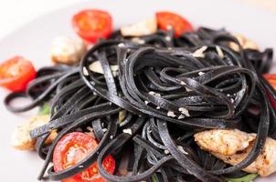 Black tagliolini pasta photo