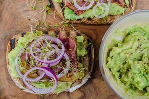 Sandwich with fresh salad and avocado