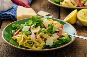 Tagliatelle with bacon, garlic and salad