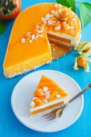 Creamy cake with coconut, mango and persimmon