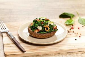 Mushrooms stuffed with spinach photo