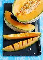 Cantaloupe melon slices. Top view photo