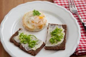 Bread with butter, chives and egg muffin photo