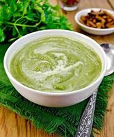 Puree green in a bowl on the board