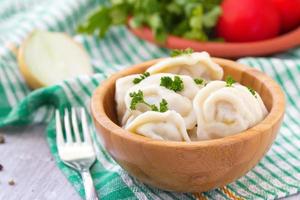 Meat pelmeni with butter