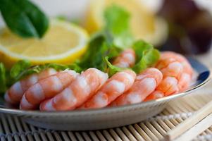 Freshly cooked prawns on a plate photo