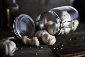 Garlic on textured background photo