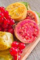 prickly pears and raspberries photo
