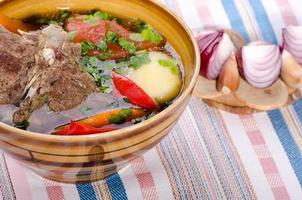 soup shurpa - traditional oriental dish with lamb