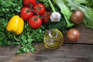 Tomatoes, peppers, garlic, onion, cilantro, lettuce leaf
