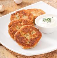 cutlets cauliflower with dill and garlic photo
