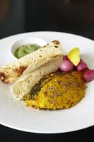 Grilled fish turmeric serve with naan photo