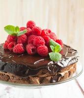 Chocolate cake with raspberries photo