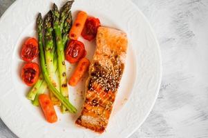 Grilled salmon with vegetables photo