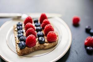 Peanut butter and berries toast photo