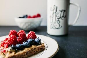 Peanut butter and berries toast photo