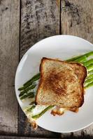 Asparagus with egg and bread a