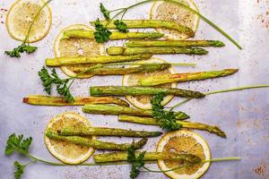 Grilled asparagus with lemon and parsley photo