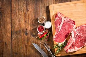 Raw fresh beef steaks photo