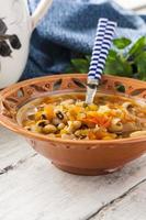 thick soup with beans and vegetables photo