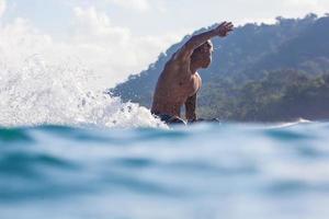 Surfing a Wave. Bali Island. Indonesia.