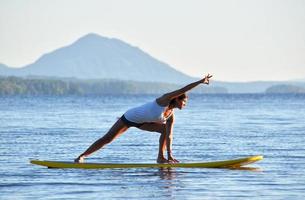 tabla de paddle yoga foto