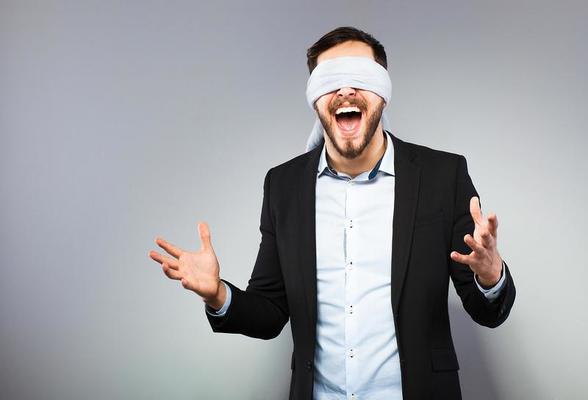 Happy Man Blindfold Person Showing Super Stock Photo 1696869070