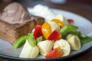 Ice cream and fruit salad almond toast bread