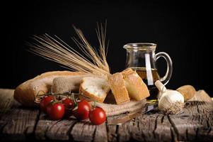 Olive Oil tomatoes and bread photo