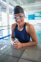 Female swimmer in the pool at leisure center photo