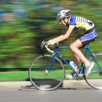 Speeding Cyclist - Blurred Motion photo