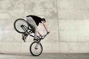 Young BMX bicycle rider photo