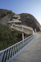 Steep steps rising up Guatape Rock, the Piedra el Penol photo