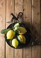 Lemon with leaves photo