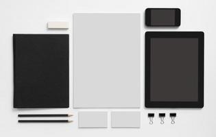 Set of stationery with tablet and mobile phone photo