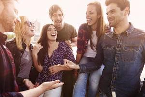 Group of people spending joyful time together photo