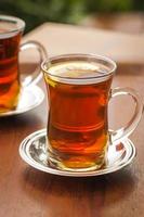 Two cups of turkish tea on a table in Istanbul photo