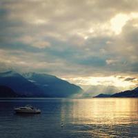 View of Lago di Como at the sunset. Aged photo. photo