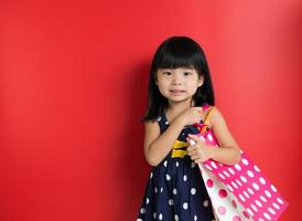 Child with shopping bags