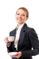 Businesswoman with coffee, isolated on white photo