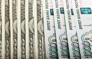 American dollars and Russian rubles photo