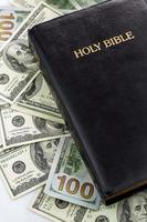 Holy Bible and money photo