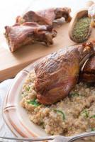 roasted goose thighs with grits photo
