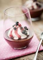 Chocolate pudding with whipped coconut cream