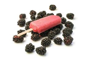 Homemade ice lolly with blackberries