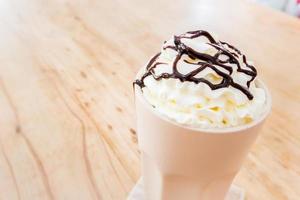 Iced coffee with whipped cream photo